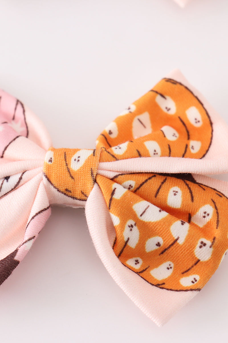 Pink pumpkin piggie hair bow