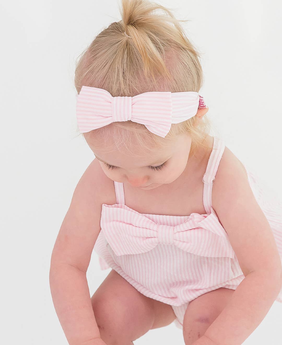 Baby Girls Pink Seersucker Bow Front Woven Bubble Romper